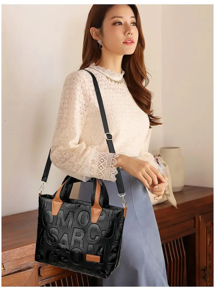 Black Embossed Letter Tote Bag for Women with Red Handles — feature 16