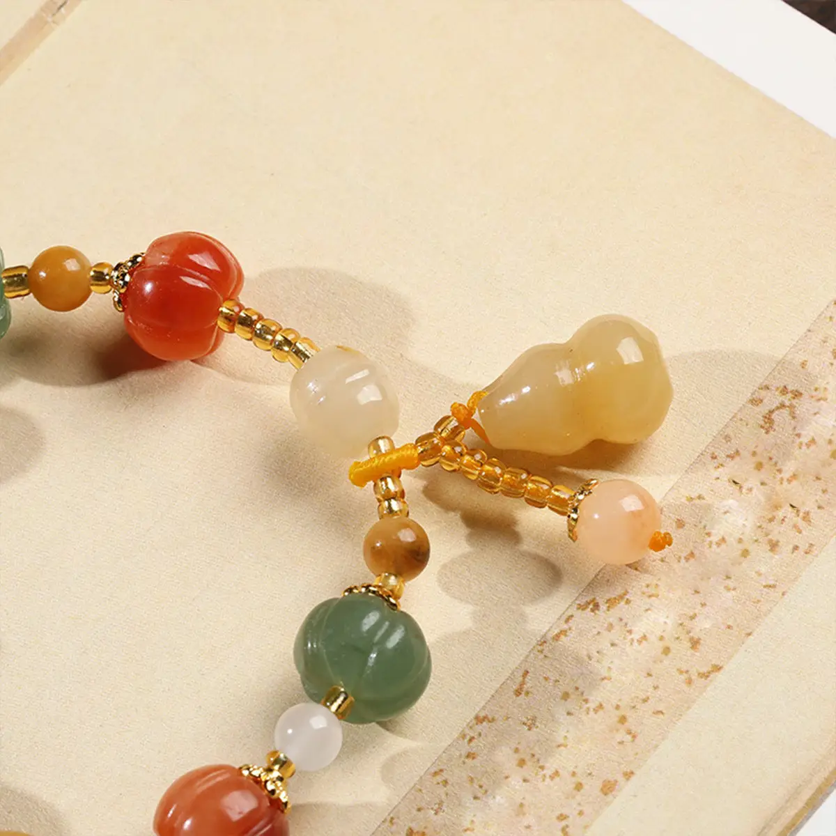 Multi-Treasure Gold Silk Jade Bracelet with Pumpkin Beads