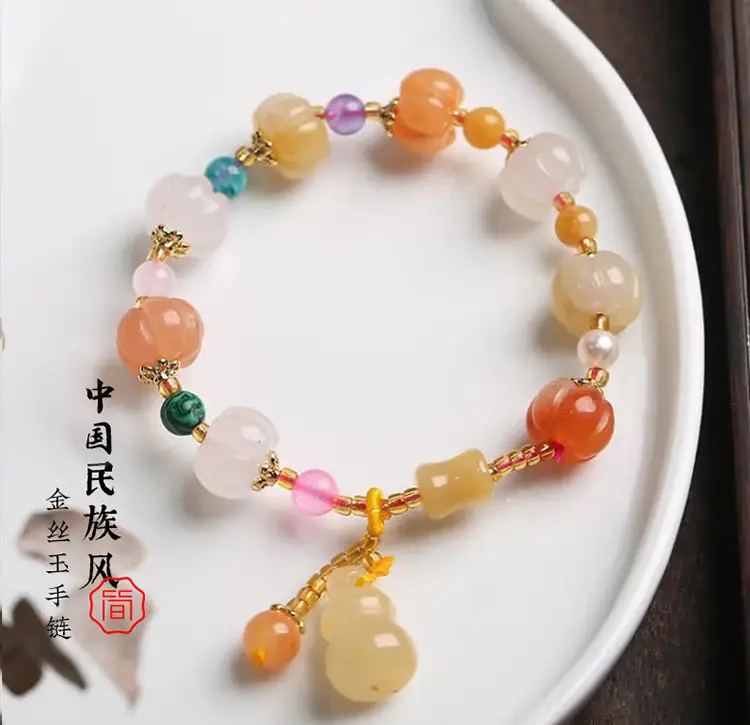 Multi-Treasure Gold Silk Jade Bracelet with Pumpkin Beads — feature 2