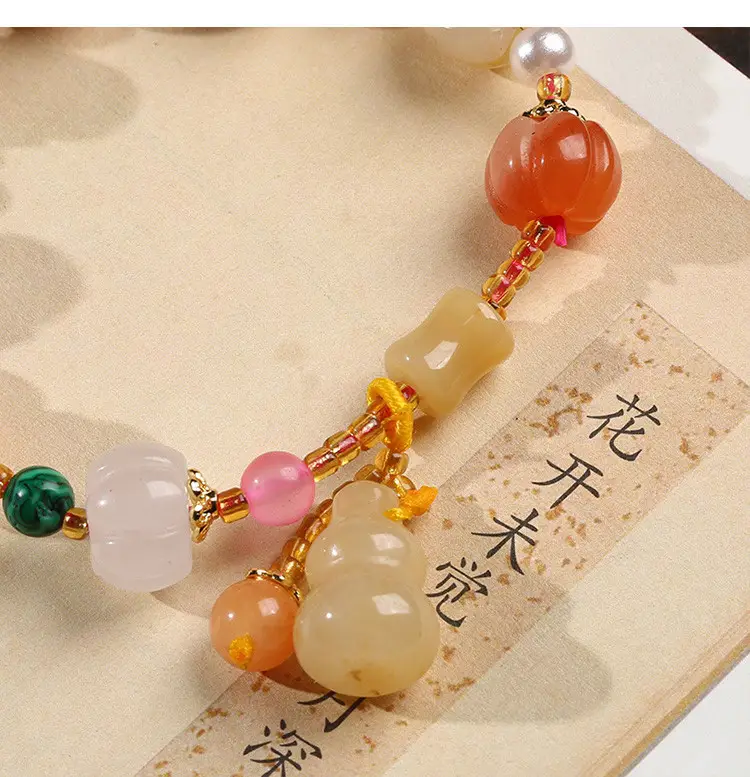 Multi-Treasure Gold Silk Jade Bracelet with Pumpkin Beads — feature 9