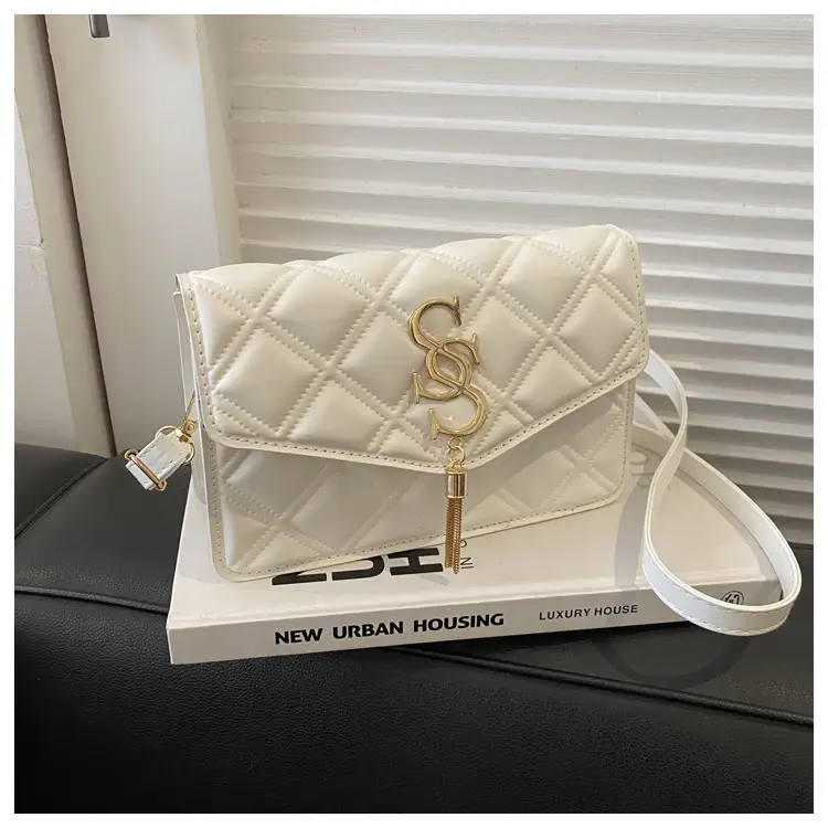 Brown Quilted Women's Shoulder Bag with Gold Logo — feature 12