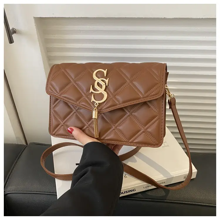 Brown Quilted Women's Shoulder Bag with Gold Logo — feature 17