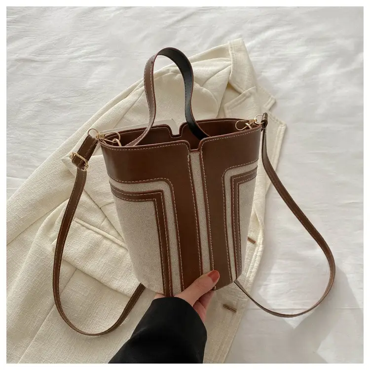 Trendy Brown Leather Bucket Bag with Crossbody Strap
