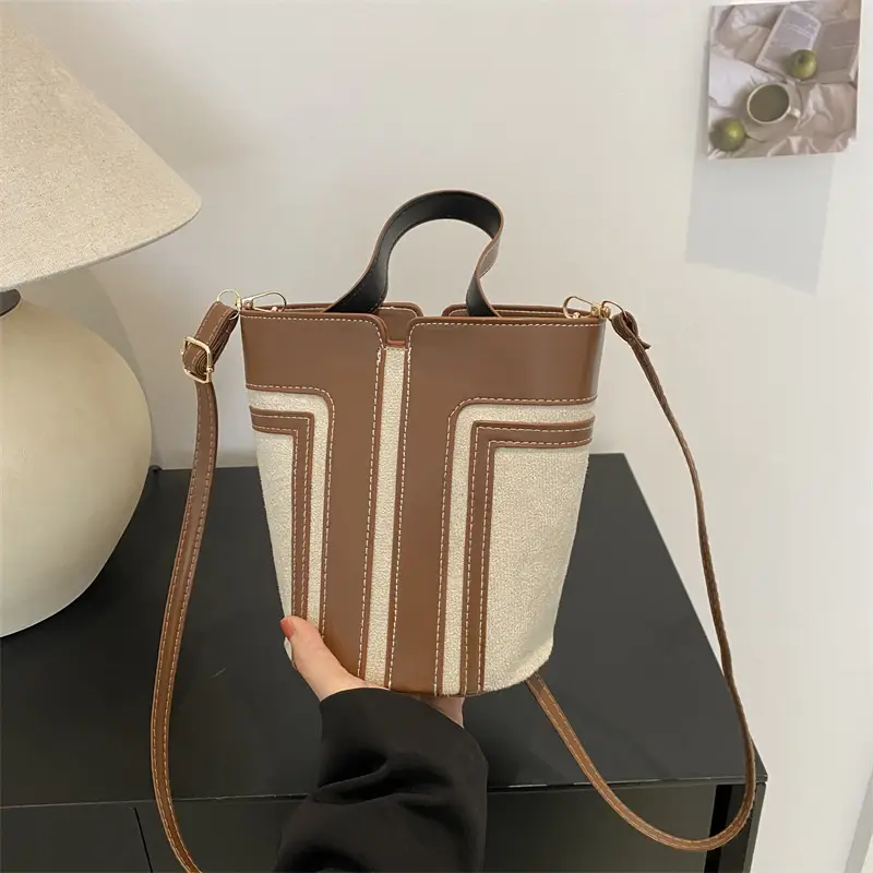 Trendy Brown Leather Bucket Bag with Crossbody Strap