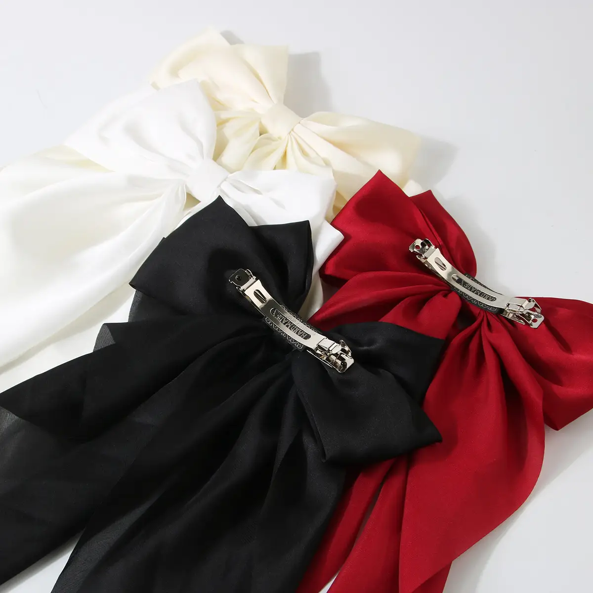 Red Oversized Bow Spring Clip Hair Accessory — feature 6