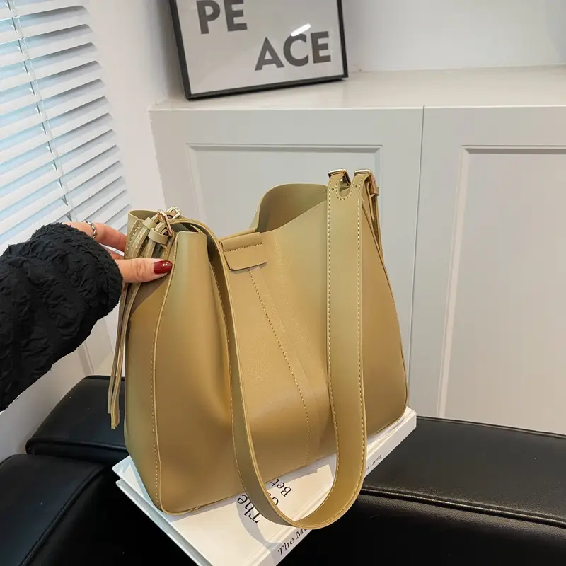 2024 Retro Brown Leather Bucket Bag with Tassel - Image 7