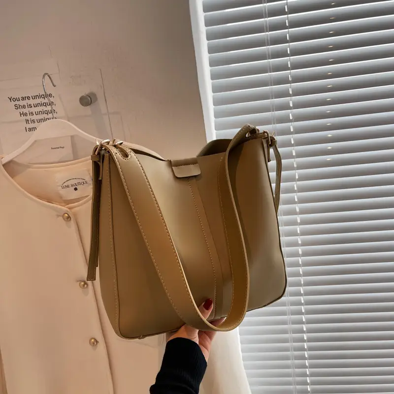2024 Retro Brown Leather Bucket Bag with Tassel - Image 9
