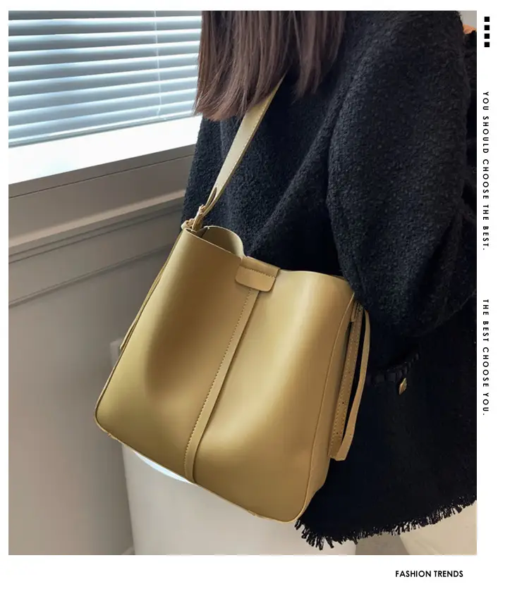 2024 Retro Brown Leather Bucket Bag with Tassel — feature 1