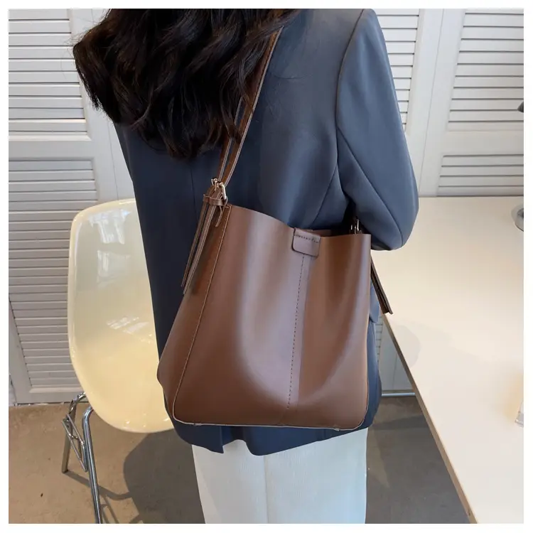 2024 Retro Brown Leather Bucket Bag with Tassel — feature 10