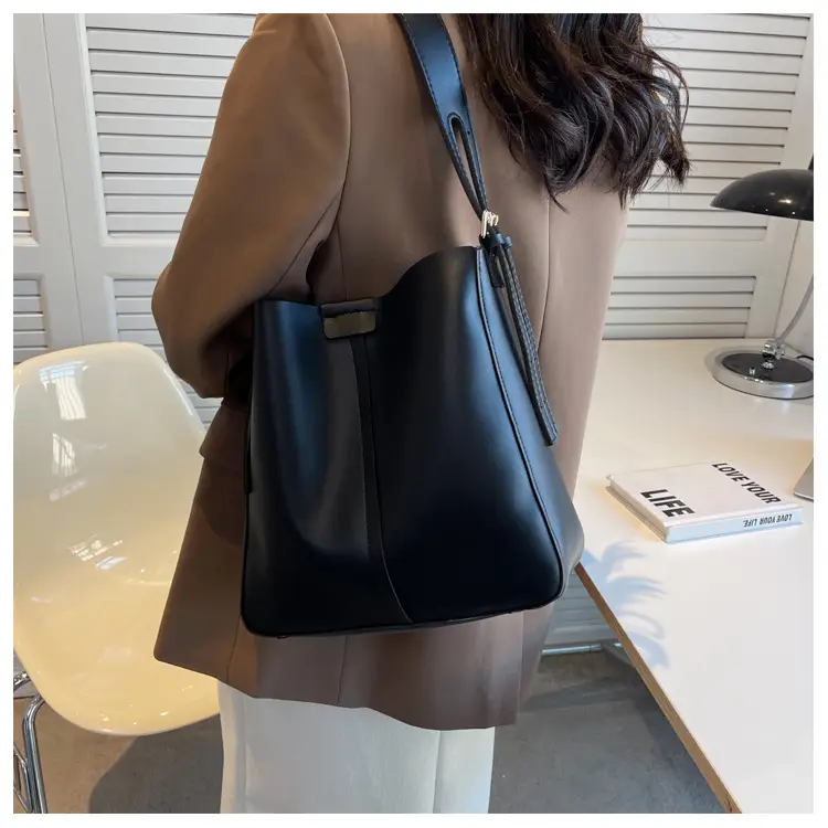 2024 Retro Brown Leather Bucket Bag with Tassel — feature 11