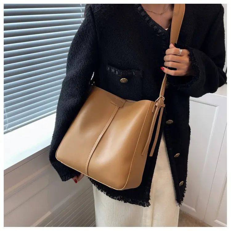 2024 Retro Brown Leather Bucket Bag with Tassel — feature 12
