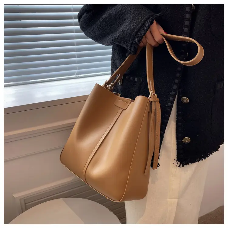 2024 Retro Brown Leather Bucket Bag with Tassel — feature 13