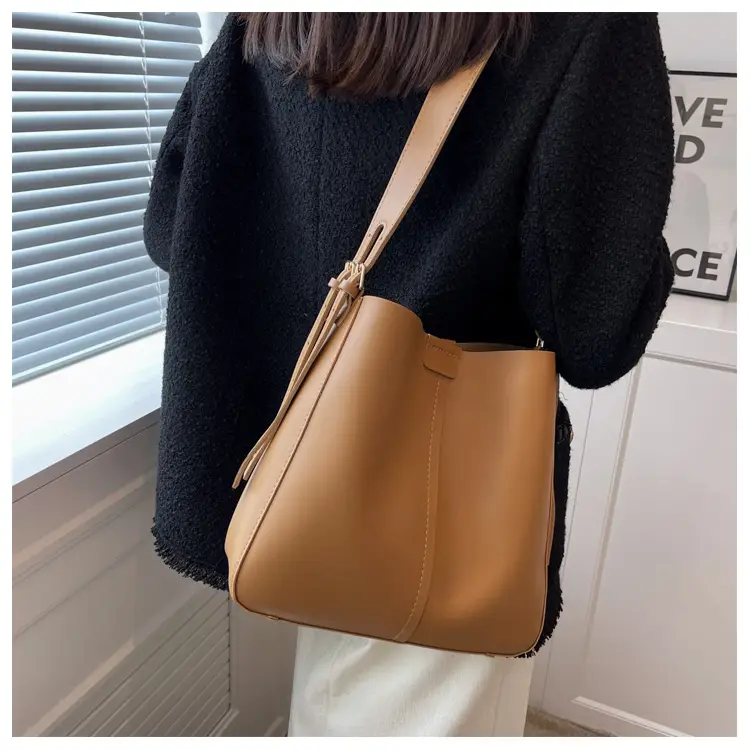 2024 Retro Brown Leather Bucket Bag with Tassel — feature 14