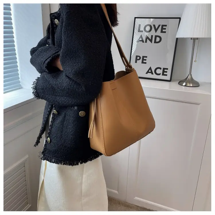 2024 Retro Brown Leather Bucket Bag with Tassel — feature 15