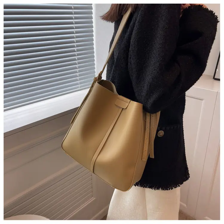 2024 Retro Brown Leather Bucket Bag with Tassel — feature 17