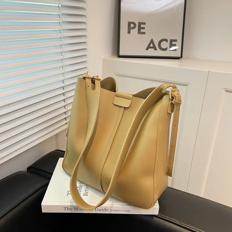 2024 Retro Brown Leather Bucket Bag with Tassel - Image 5