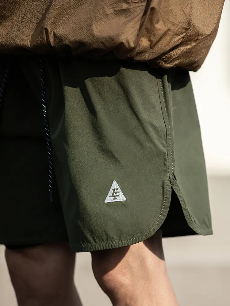 Hanlu Men Green Casual Shorts with Arc Hem
