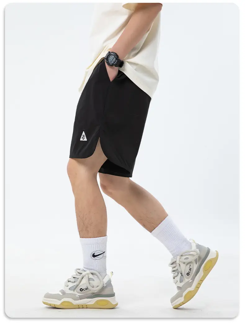Men Curved Slit Sports Shorts Black White — feature 23