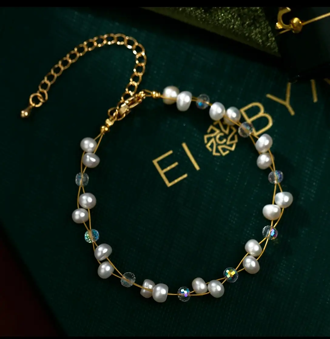 Natural Pearl Bracelet with Starling Design — feature 1