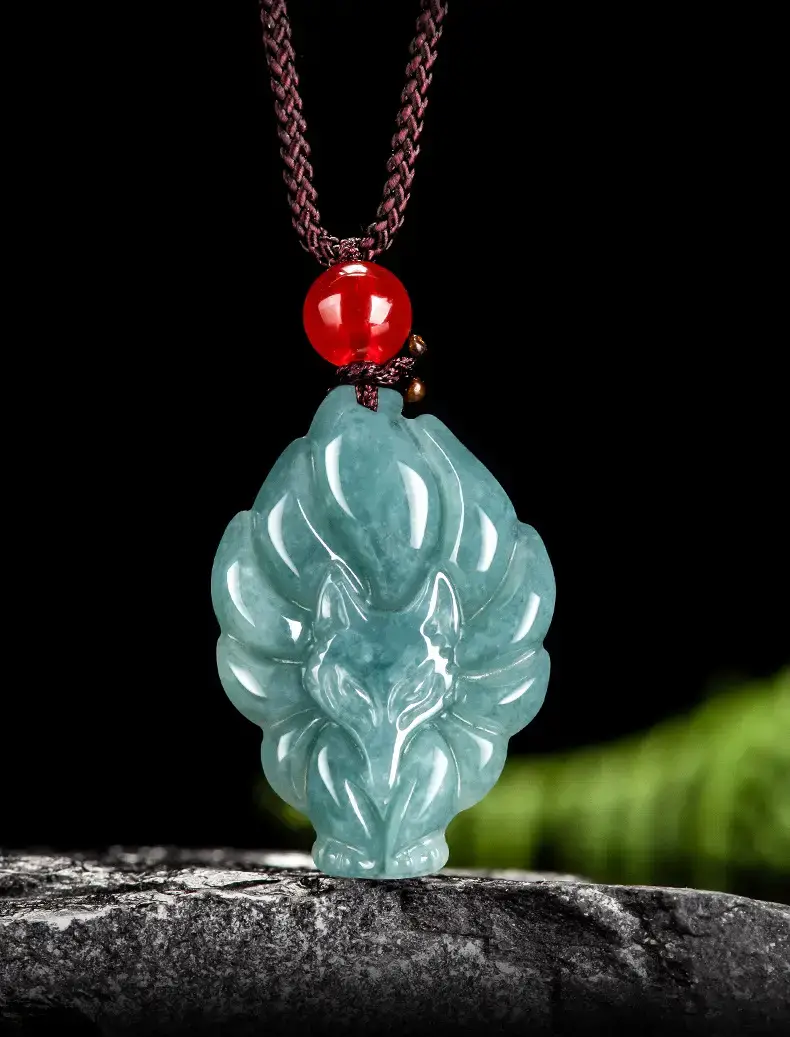 Natural Jade Blue Fox Pendant with Red Bead — feature 2