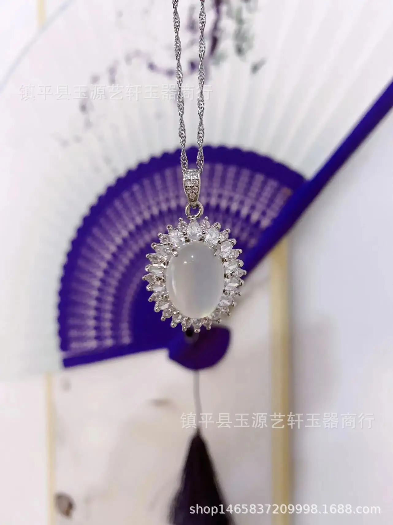 White Ice Laid Egg Pendant Necklace with Chalcedony Gemstones — feature 1