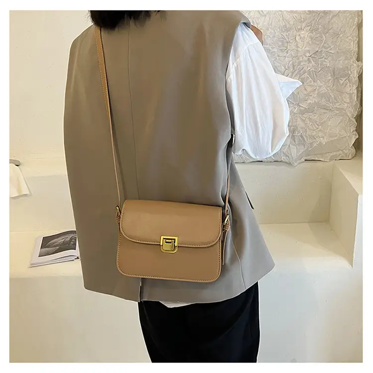 Elegant Women's Brown Messenger Bag with Gold Clasp — feature 17