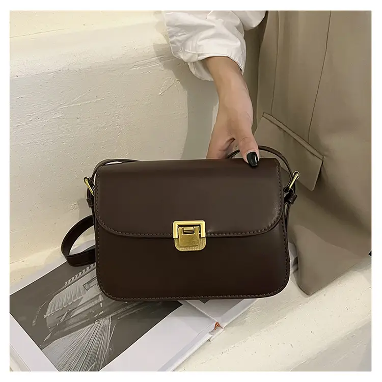 Elegant Women's Brown Messenger Bag with Gold Clasp — feature 28