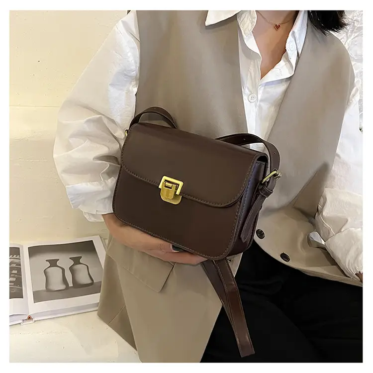 Elegant Women's Brown Messenger Bag with Gold Clasp — feature 31