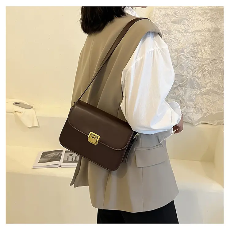 Elegant Women's Brown Messenger Bag with Gold Clasp — feature 32