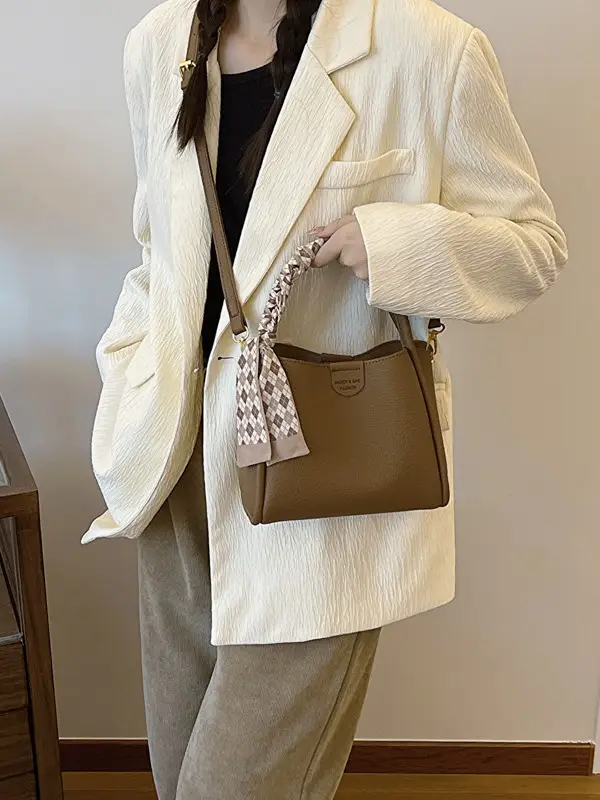 Women's Brown Leather Bucket Bag with Tassel Handle - Image 6
