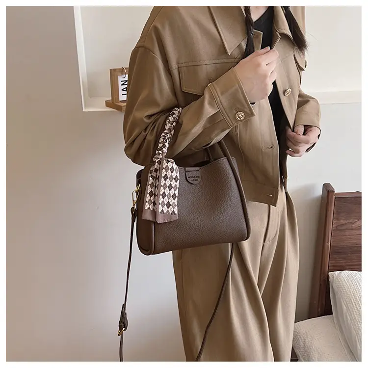 Women's Brown Leather Bucket Bag with Tassel Handle — feature 12