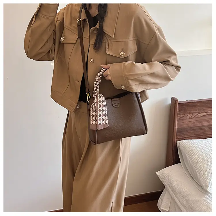 Women's Brown Leather Bucket Bag with Tassel Handle — feature 14