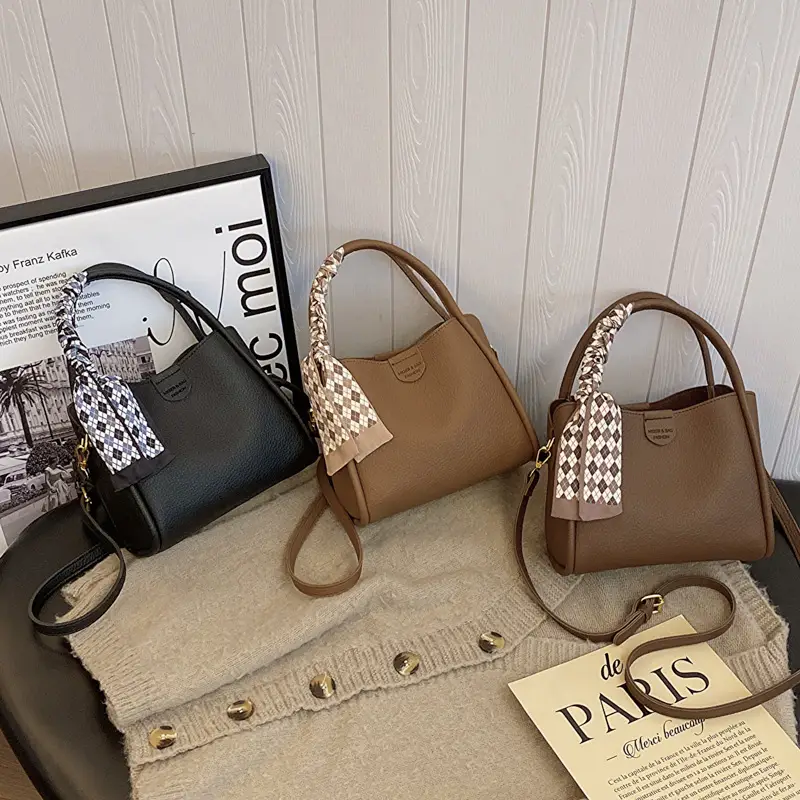 Women's Brown Leather Bucket Bag with Tassel Handle — feature 18