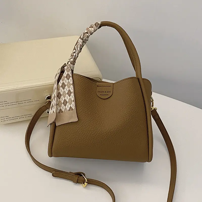 Women's Brown Leather Bucket Bag with Tassel Handle - Image 3