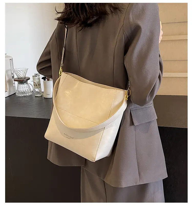 Brown Leather Bucket Bag with Wide Strap for Women — feature 1