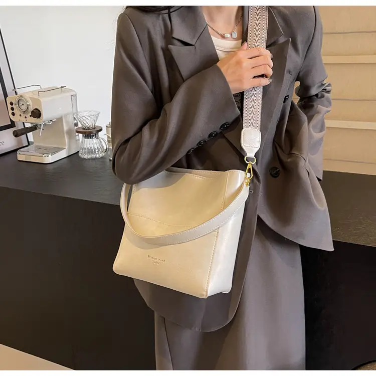Brown Leather Bucket Bag with Wide Strap for Women — feature 12