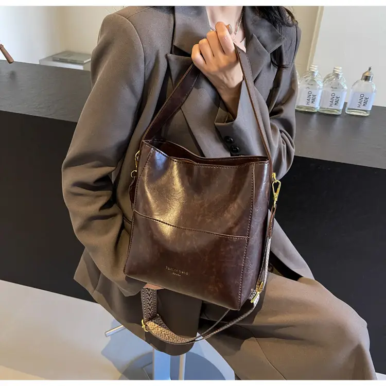 Brown Leather Bucket Bag with Wide Strap for Women — feature 16