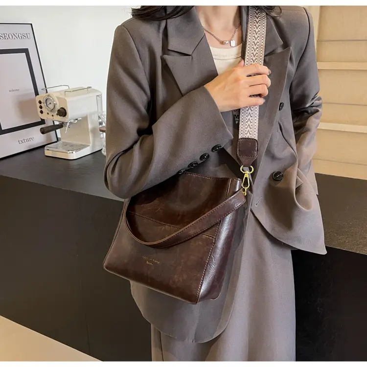 Brown Leather Bucket Bag with Wide Strap for Women — feature 17