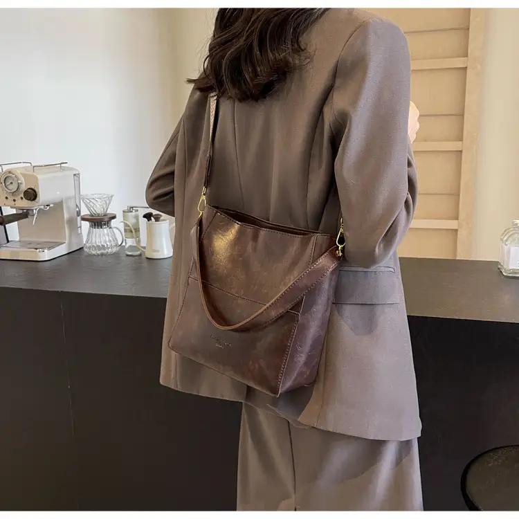 Brown Leather Bucket Bag with Wide Strap for Women — feature 18