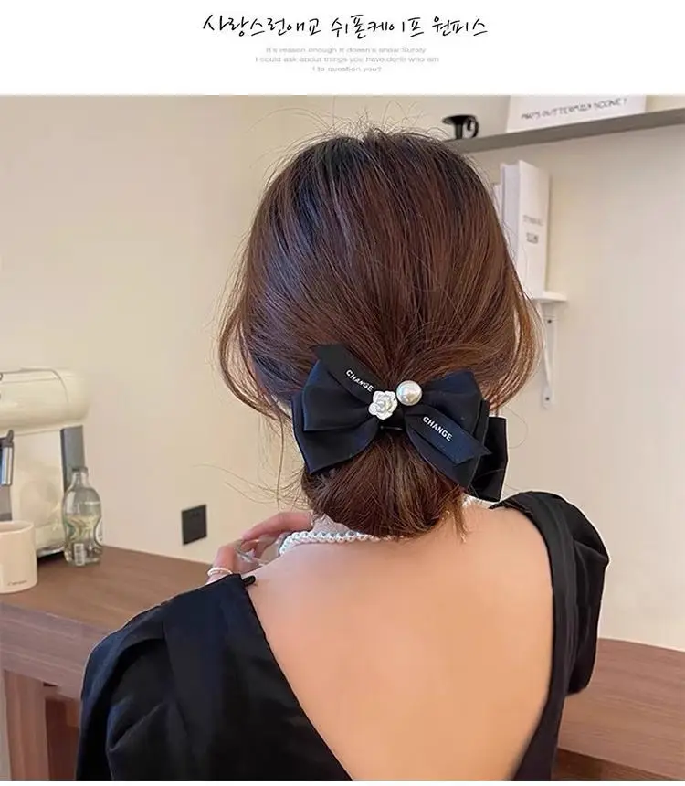 French Camellia Hairpin Black White Pearl Bow Updo — feature 3