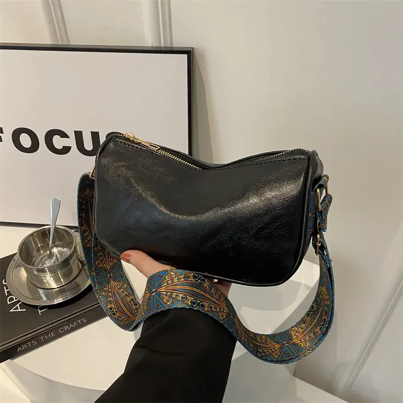 Green Leather Crossbody Bag with Patterned Strap