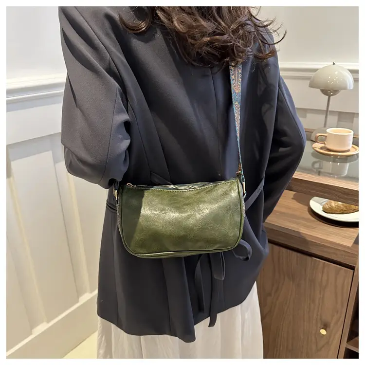 Green Leather Crossbody Bag with Patterned Strap — feature 9