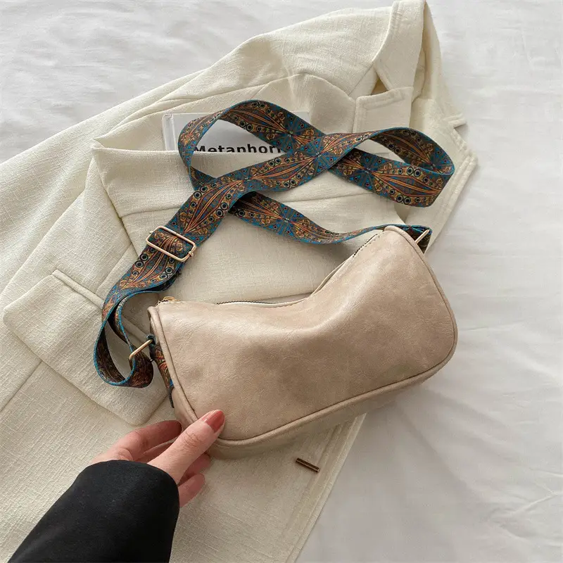 Green Leather Crossbody Bag with Patterned Strap