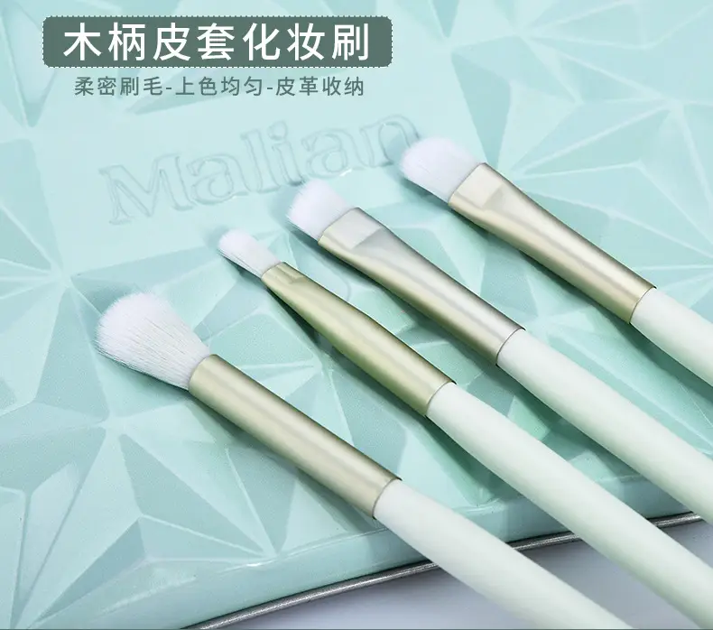 Five-Piece Wooden Makeup Brush Set with Leather Case β feature 1