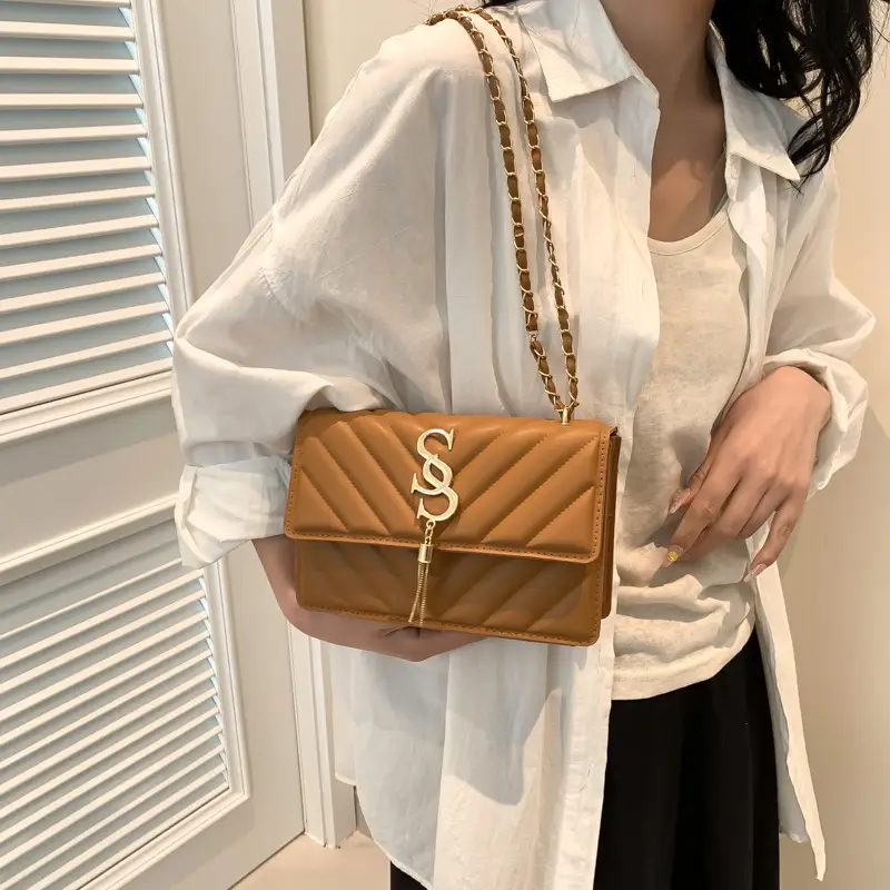 Women's tan quilted shoulder bag with chain strap - Image 7