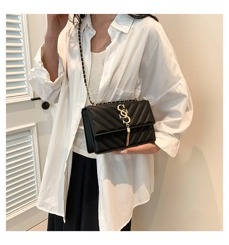 Women's tan quilted shoulder bag with chain strap — feature 13