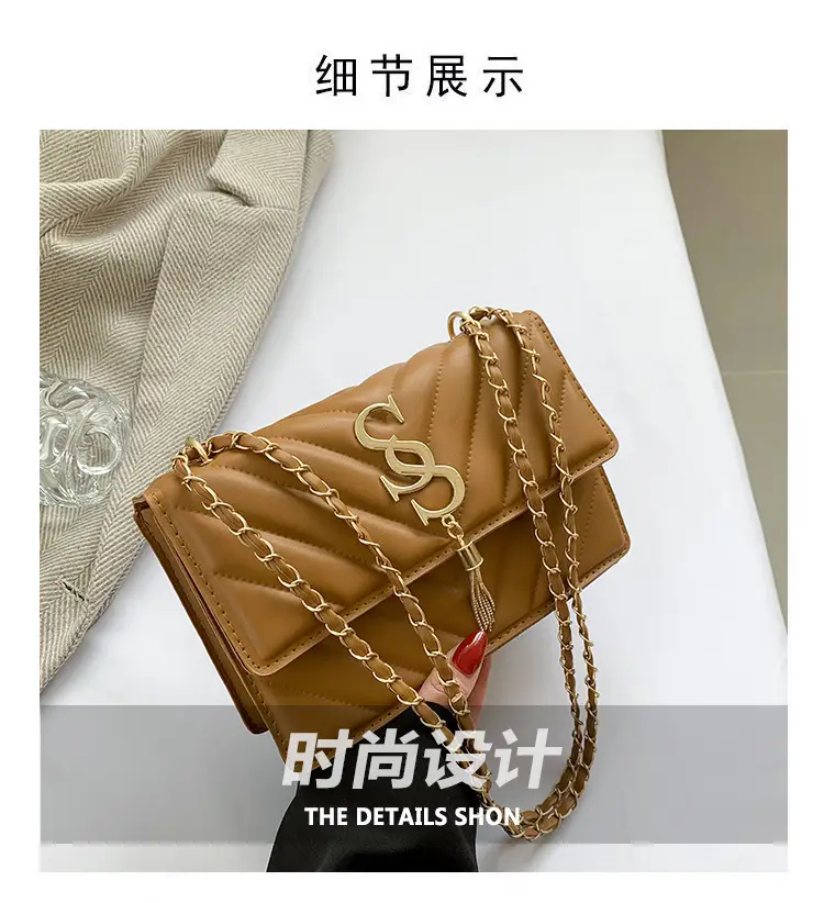 Women's tan quilted shoulder bag with chain strap — feature 20