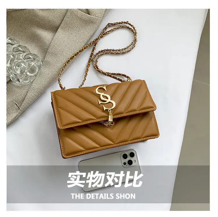 Women's tan quilted shoulder bag with chain strap — feature 4
