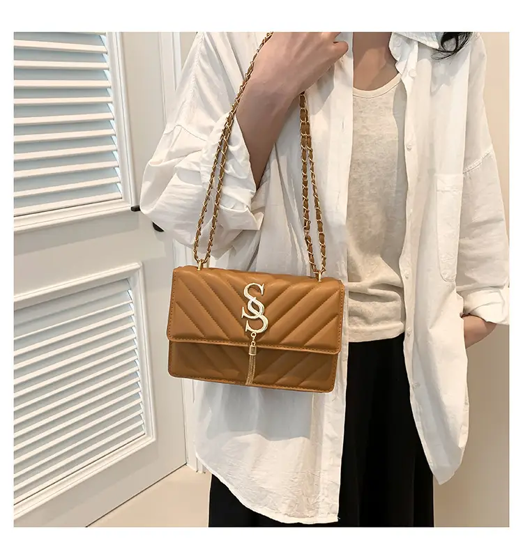 Women's tan quilted shoulder bag with chain strap — feature 8