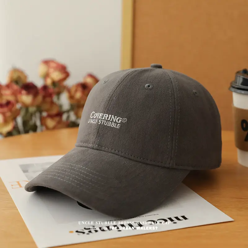 Men's Black Stubble Cap with "Catching Angels" Design — feature 13